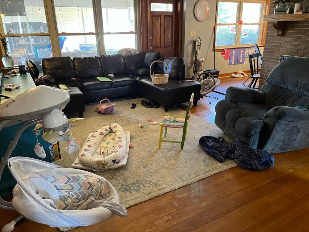 messy living room before cleaning services